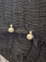 Boucles d'oreilles en perle et brillant. Diamant ? 