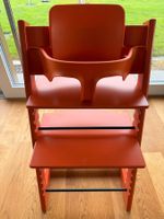 Stokke Tripp Trapp Hochstuhl orange mit Babysicherung