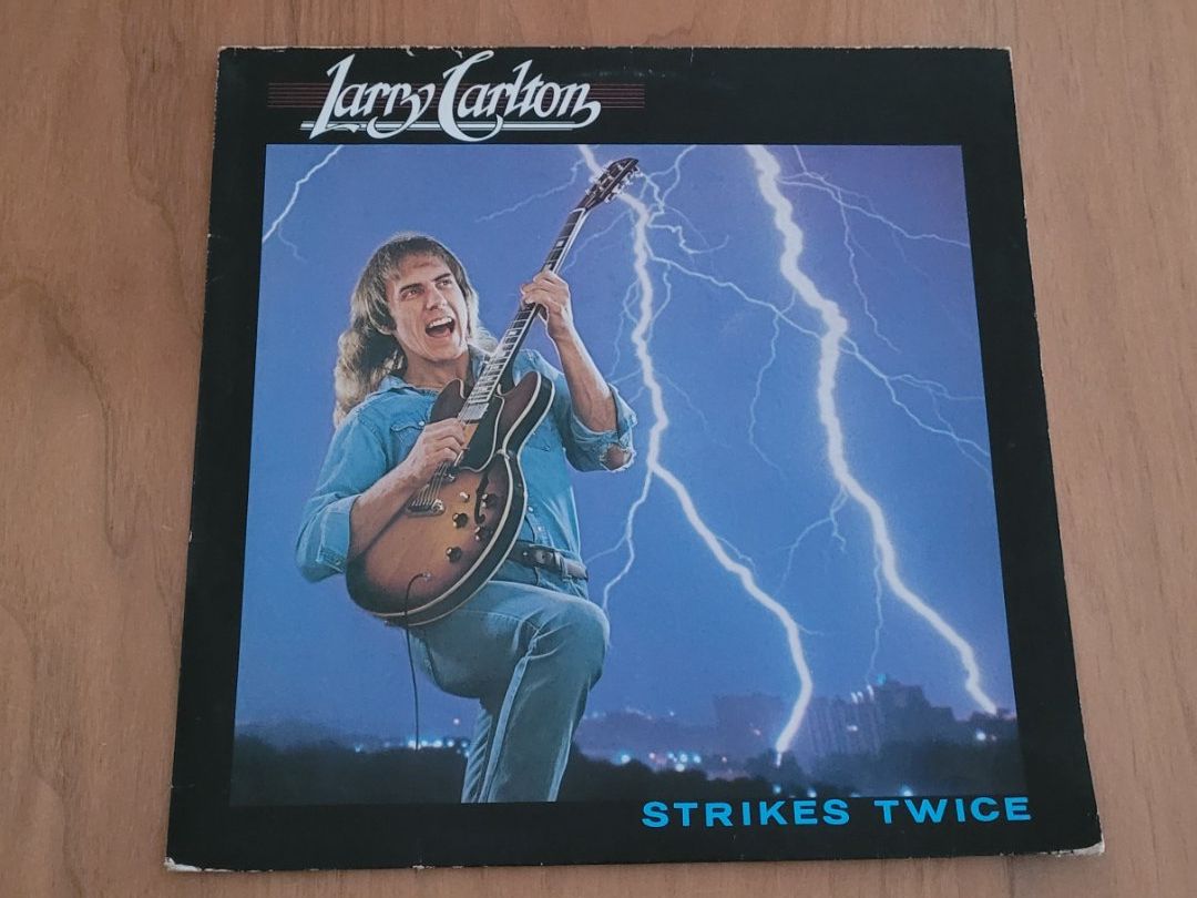 Vinyles: LP  Larry Carlton – D'occasion à Martigny par MZ-67