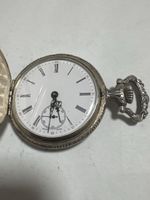 Montre de poche ancienne argentée avec décoration scène rura