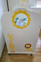 Einzigartiges Babybett aus Massivholz
