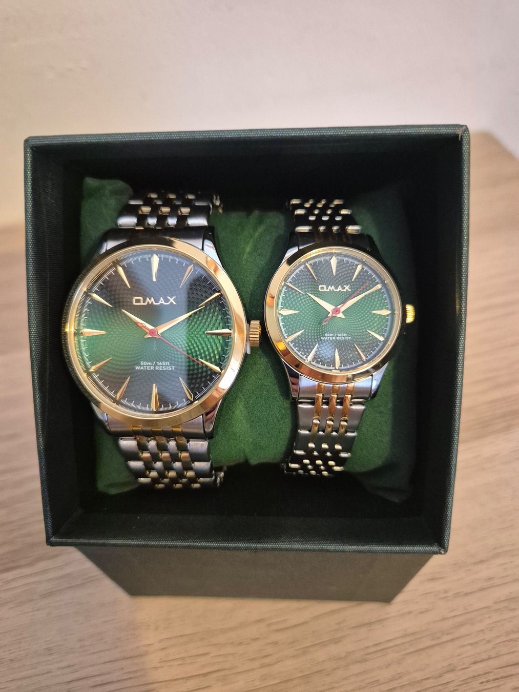Orologi: OMAX Partneruhrenset bicolor / grün – Nuovo e nell'imballaggio originale da Zürich venduto da zah_967f