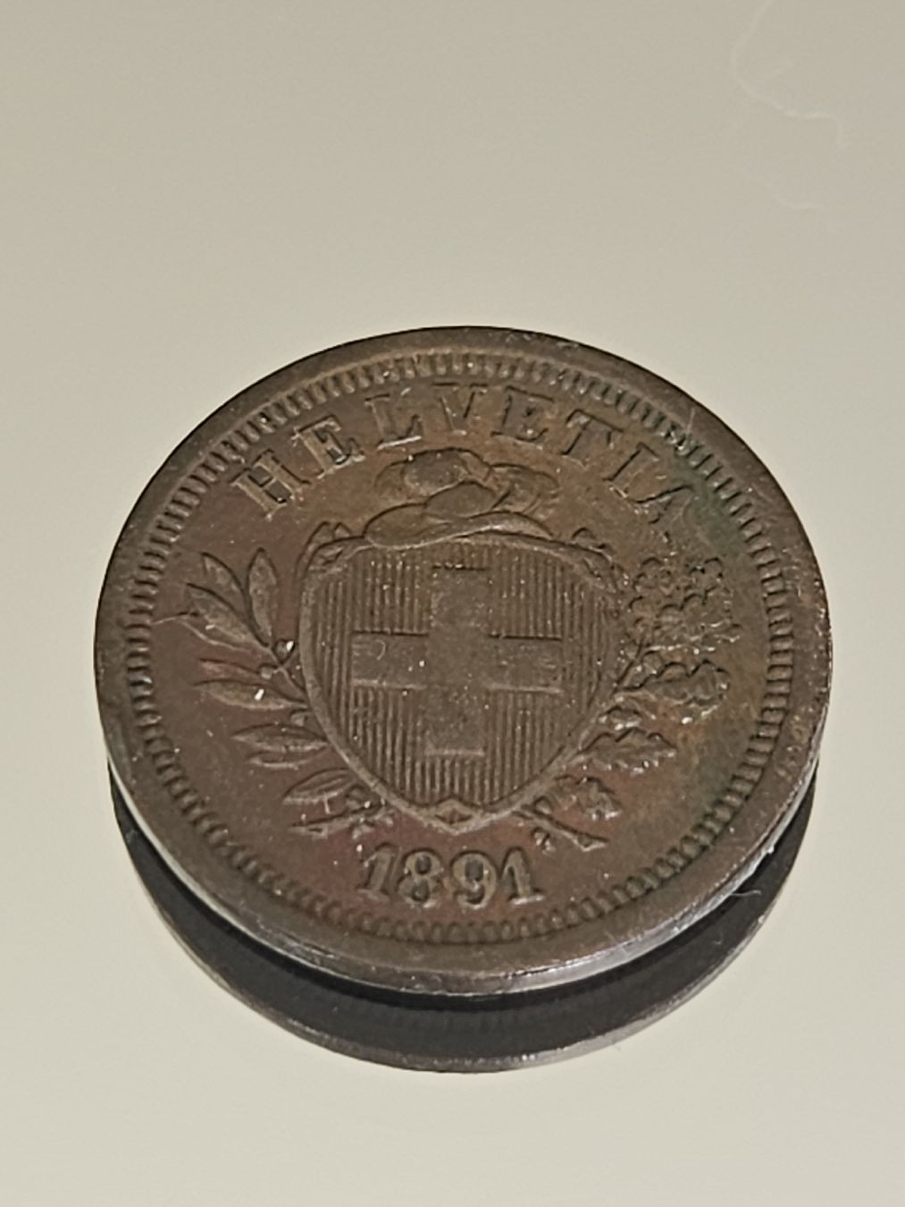 Tutti le monete: 1 Rappen 1891 sch. Kreuz – Usato da Pfäffikon ZH venduto da Melibol