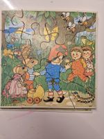 Süsses Kinder Puzzle Muck mit 24 Teilen aus Holz