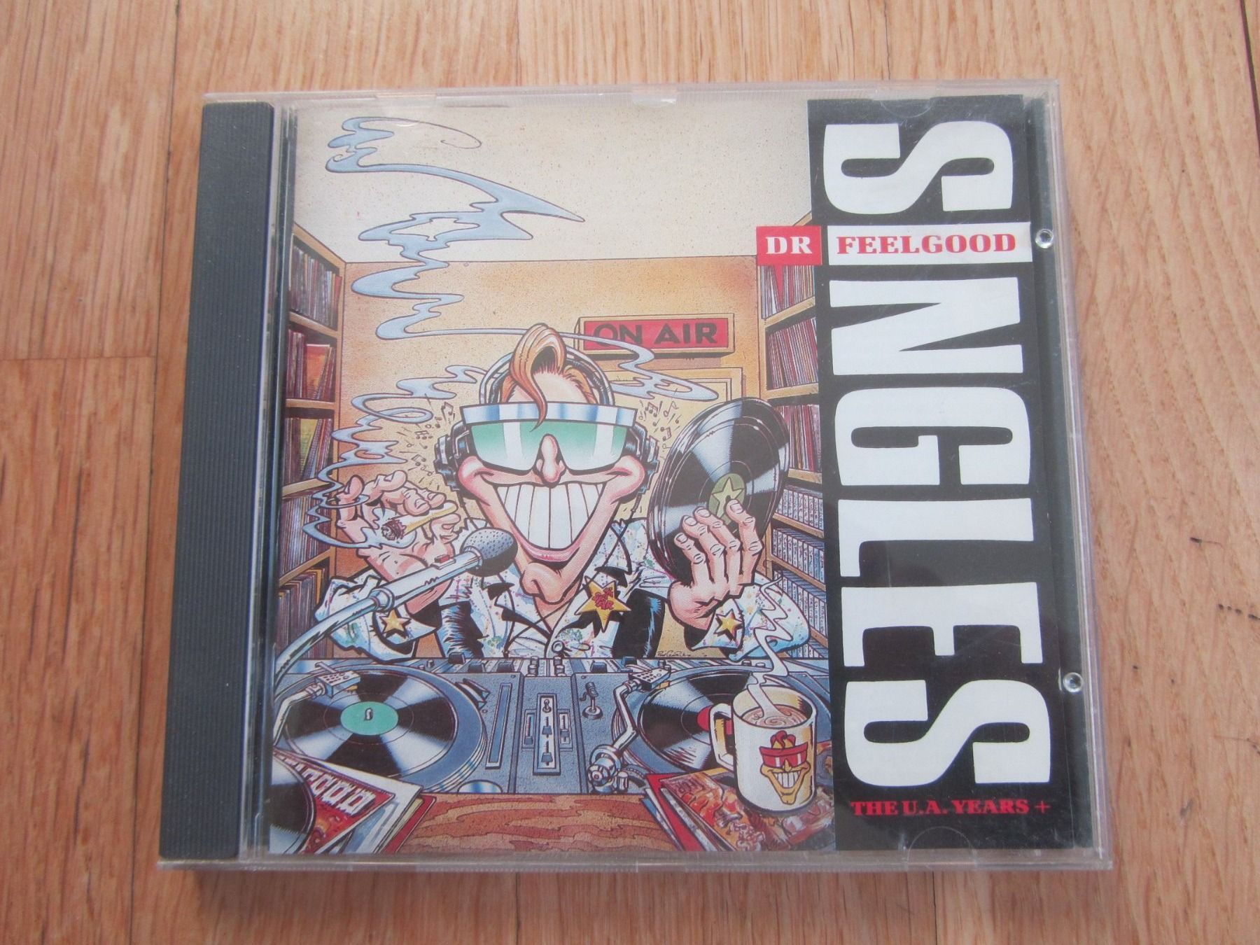 CD: DR. FEELGOOD:  Singles – Usato da Seengen venduto da mikelele