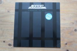 ALCATRAZZ - DISTURBING THE PEACE - EX- RAINBOW VINYL LP