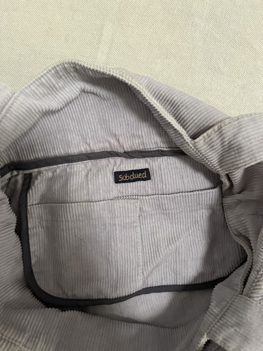 Borse da donna: Borsa Subdued con fiocco a coste lilla chiaro. – Usato da Mendrisio venduto da cost.del 4