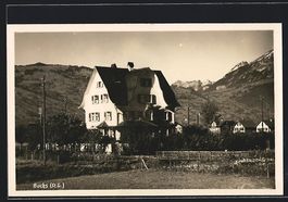 AK Buchs, Gebäudeansicht mit Bergen