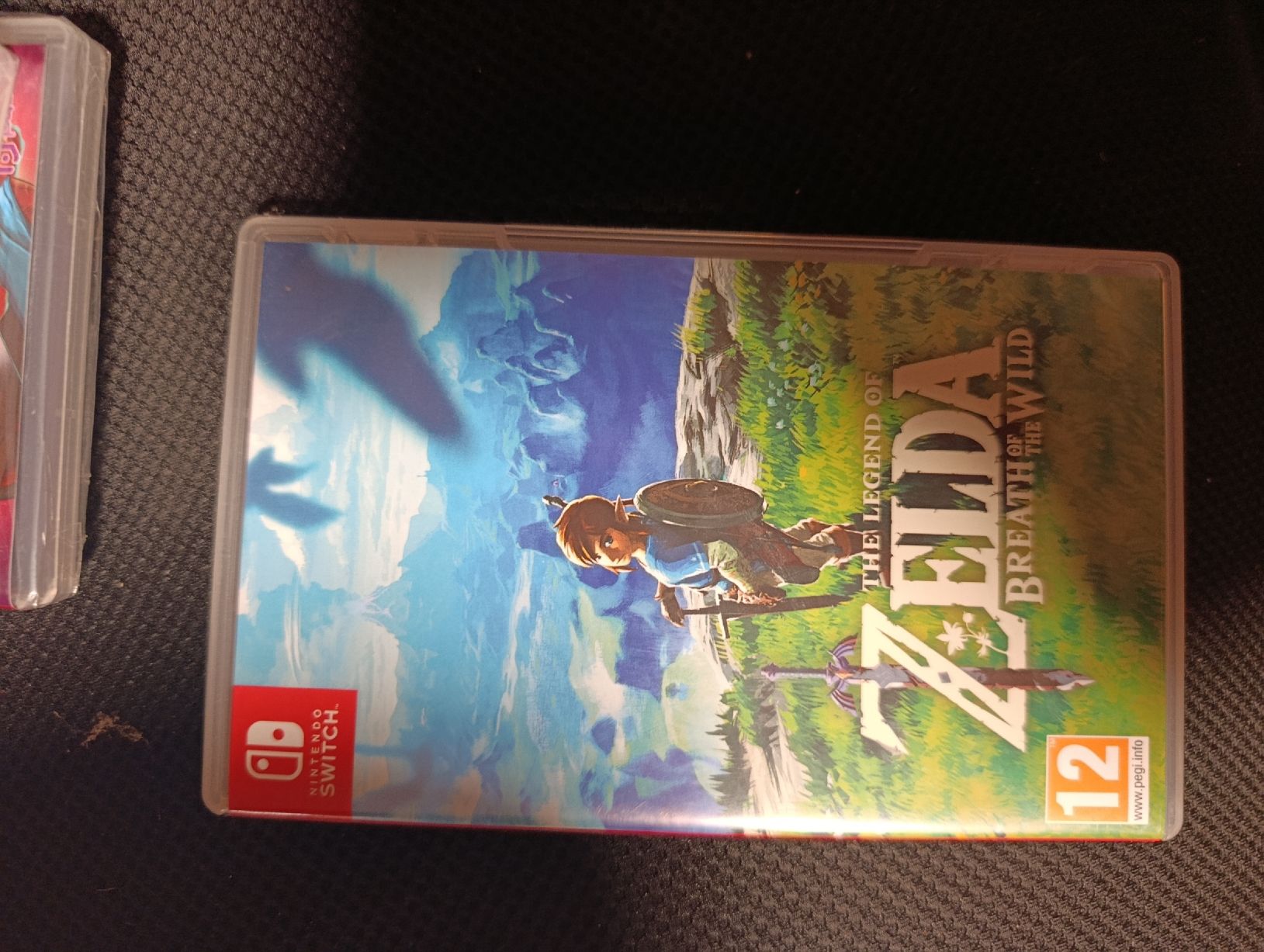 Nintendo Konsolen: Nintendo Switch Console avec Joy-Cons + jeux  – Gebraucht aus Develier von chr_s2d2 1