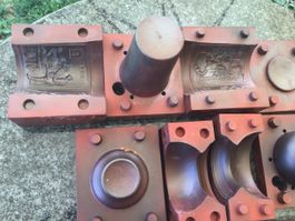 Giessformen Gussteile Werkzeuge Gusseisen rot  Becher Figure