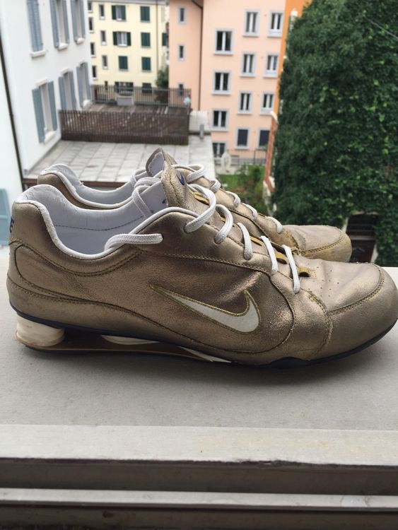 nike shox gold
