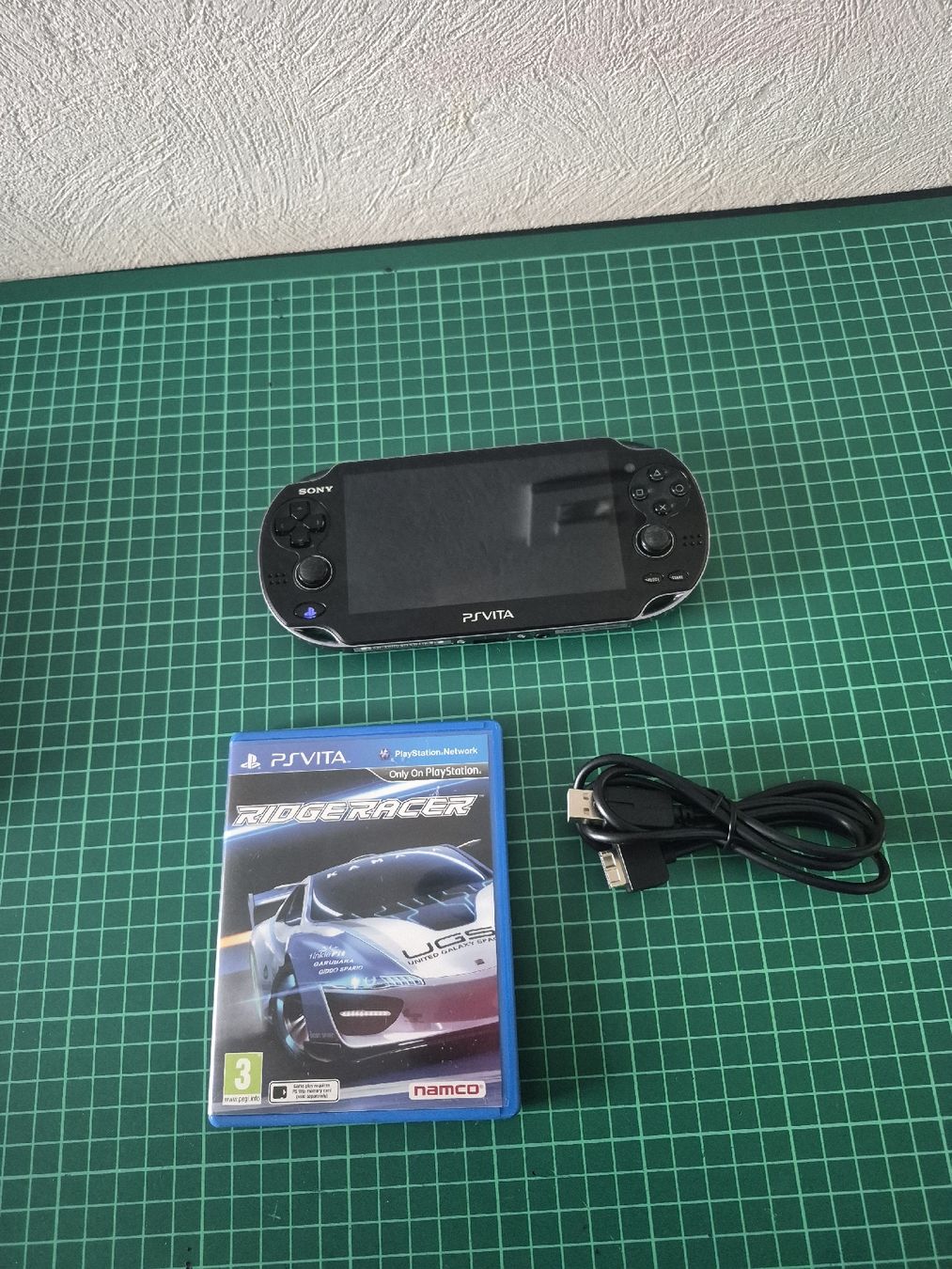 Sony Consoles: Sony PS Vita oled + Ridge Racer  – D'occasion à Meyrin par Retro-GZ