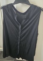 Schwarze ärmellose Bluse