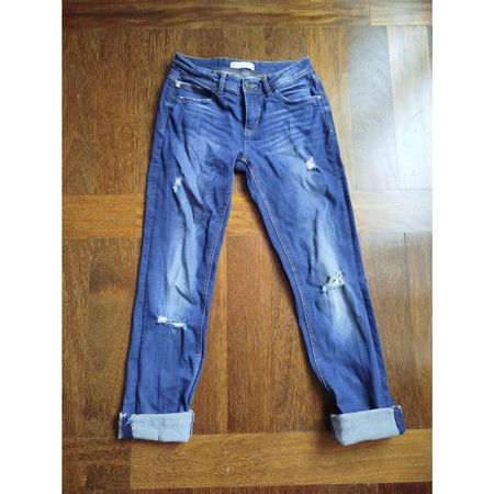 Jeans mit Rissen/Löchern