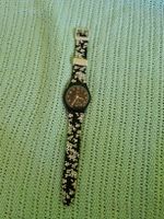 Schicke Swatch Damenuhr mit Blumenmuster - Sommer Look!