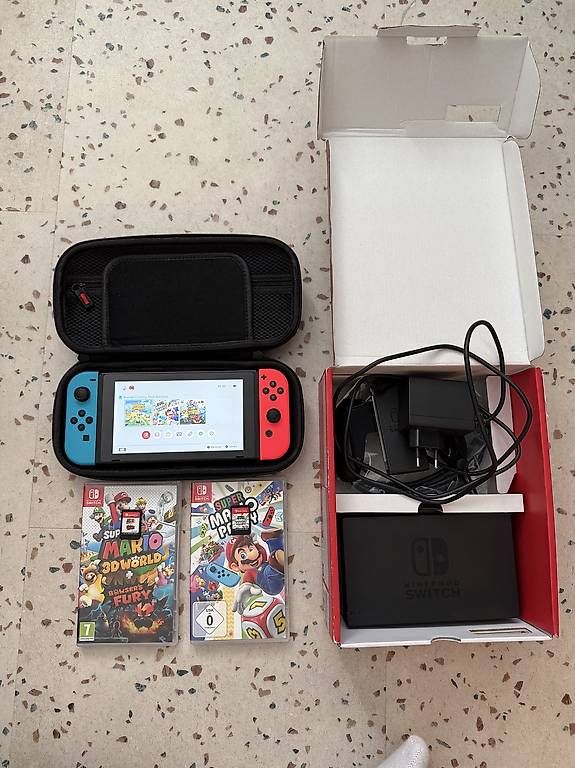 Nintendo Consoles: Nintendo Switch V2 TOP Zustand + 3 Spiele – D'occasion à Aegerten par Elham_6365