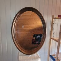 Miroir mural ovale avec cadre en bois
