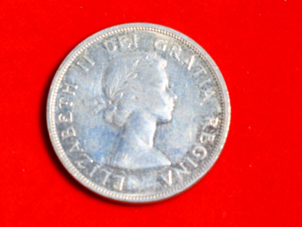 Tutti le monete: 1 Silber Dollar von Kanada 1963   M1106B – Usato da Bettingen venduto da Gluscht-Oase 1