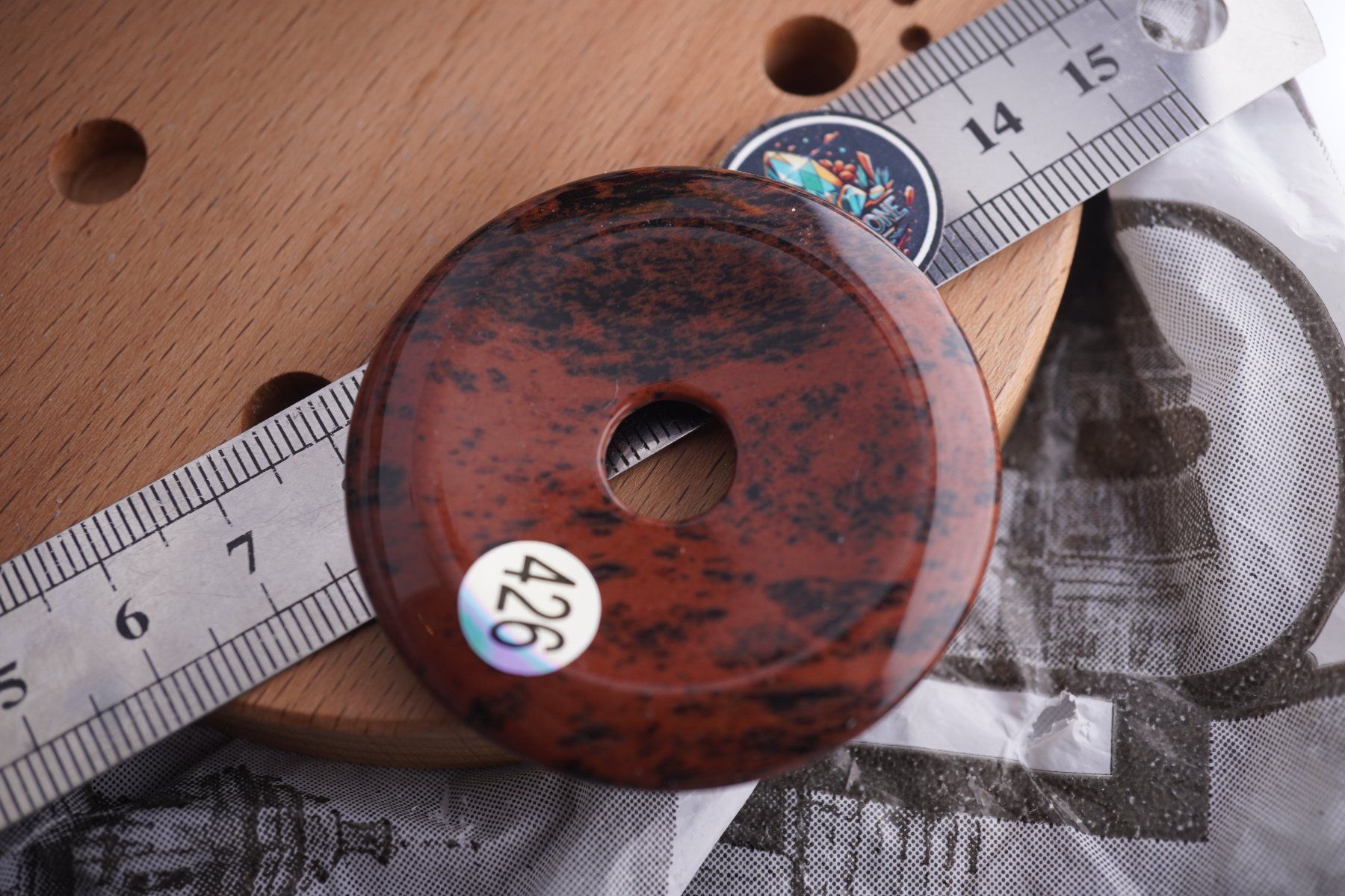 Minerali & Pietre curative: Obsidian    Donut   pi Scheibe      50mm Ab 1.- – Nuovo e nell'imballaggio originale da Eschenbach SG venduto da topstone