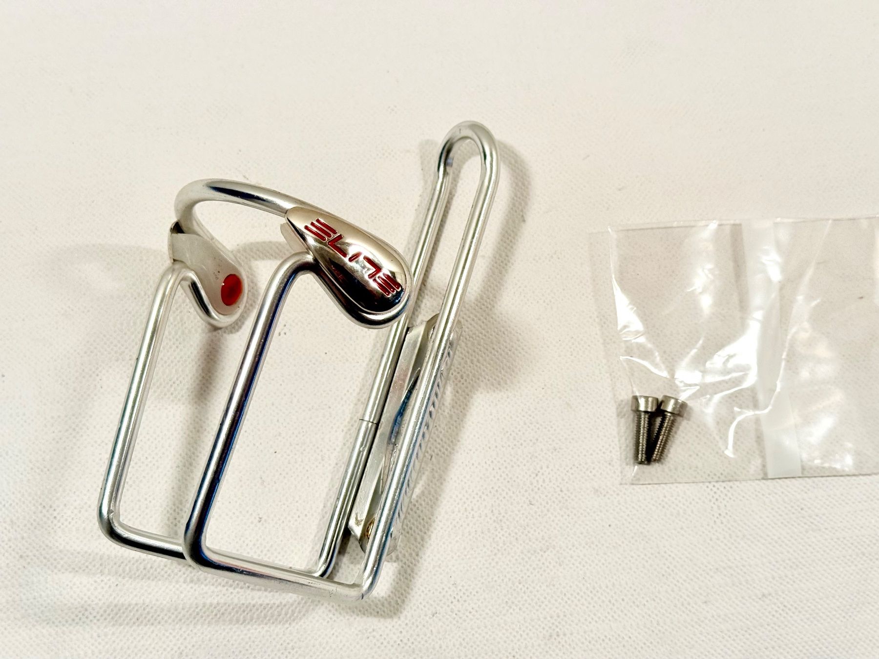 Pièces détachées: ELITE Bottle Cage Flaschenhalter 2606 – D'occasion à Luzern par bikeandbeltcom 1