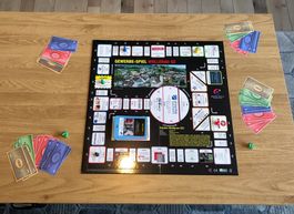Brettspiel "Ein Mix aus Monopoly und Leiterlispiel"