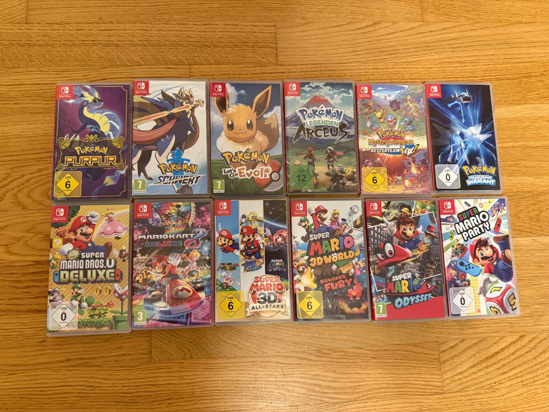 Nintendo Konsolen: Nintendo Switch Komplettset - 12 Spiele, Pro Controller uvm. – Gebraucht aus Wetzikon ZH von AdjacentDavid 1