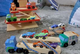 Wood Garage with trucks and an old fashioned top