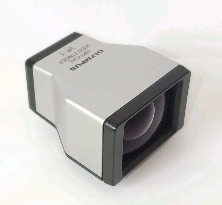 Olympus Obiettivi: Olympus VF-1 View Finder – Usato da Wolfhausen venduto da Foto-Brocki