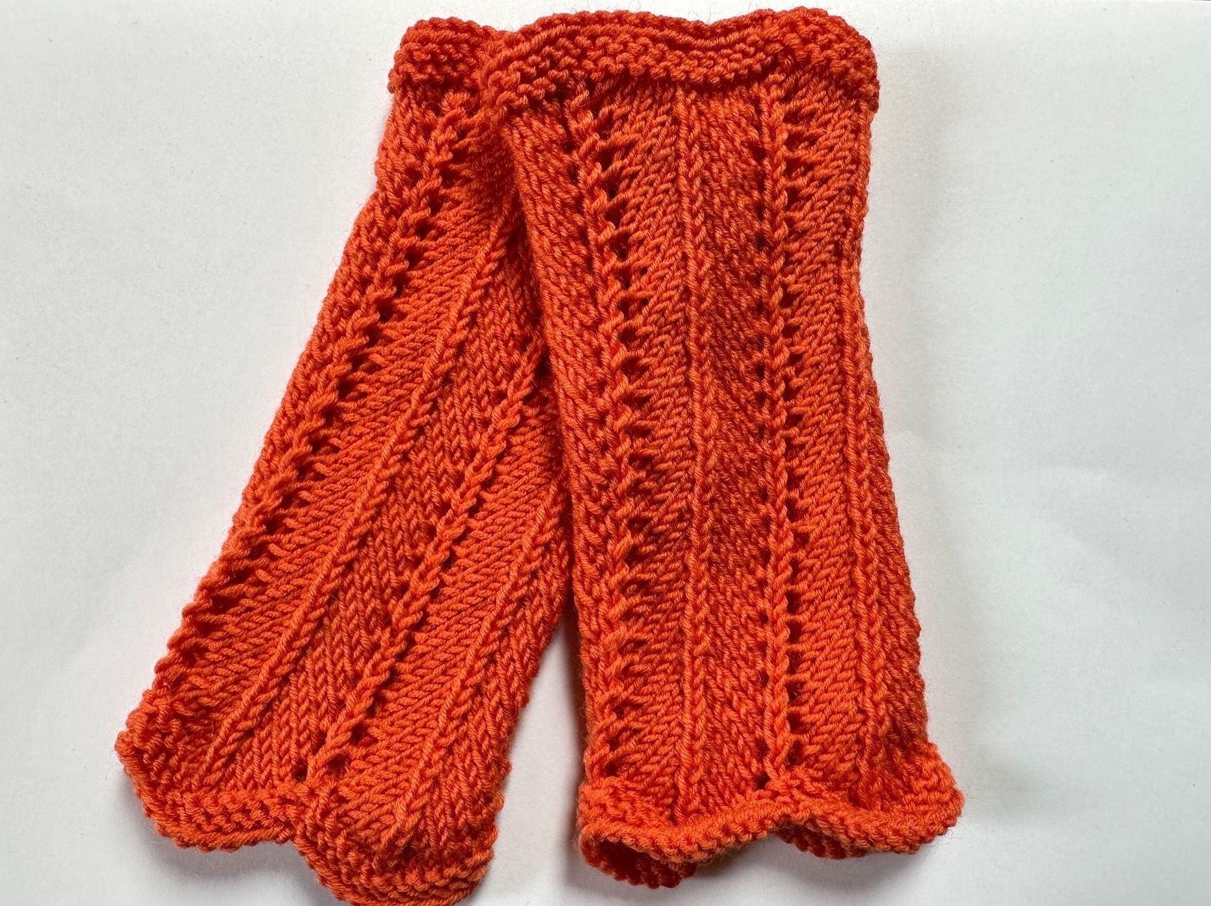 Guanti & manicotti: Pulswärmer handgestrickt orange – Nuovo e nell'imballaggio originale da Pfäffikon ZH venduto da Suribu