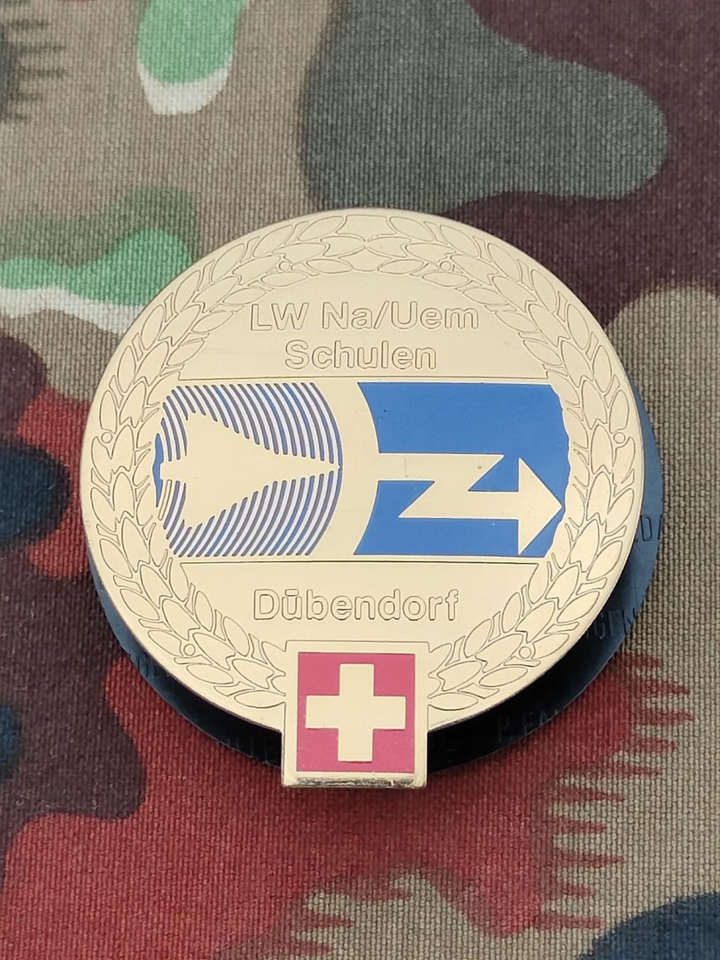 Placchette & Badge: Béretemblem LW Na/Uem Schulen Dübendorf – Usato da Bauma venduto da SwissMilitaria