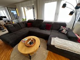 Ecksofa dunkelgrau mit Schlaffunktion gebrauchter Zustand