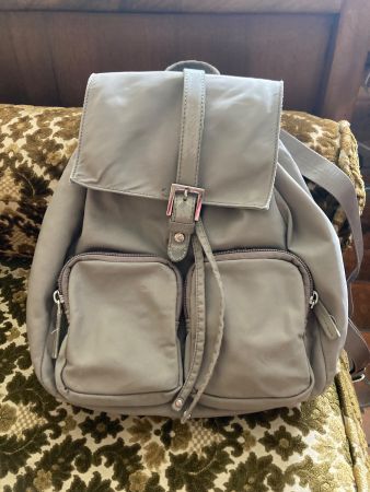 Sac à dos Lancaster beige d’occasion.