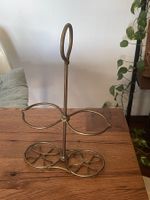 Dekorative Vintage Flaschenhalterung aus Messing