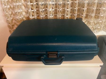 Hartschalen Reisekoffer "American Tourister" in grün