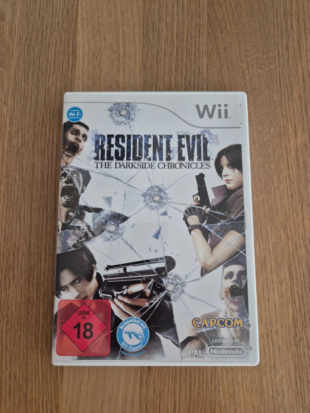 Nintendo Spiele: Resident Evil The Darkside Chronicles (Wii) – Gebraucht aus Schneisingen von jordan60078