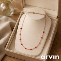 Kette mit orangen Perlen- Neu