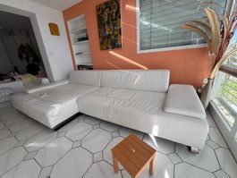 Canapé d'angle en cuir blanc en bon état général