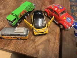 4 Modellautos: VW, Smart, Postauto, Kehrichtwagen (g1)