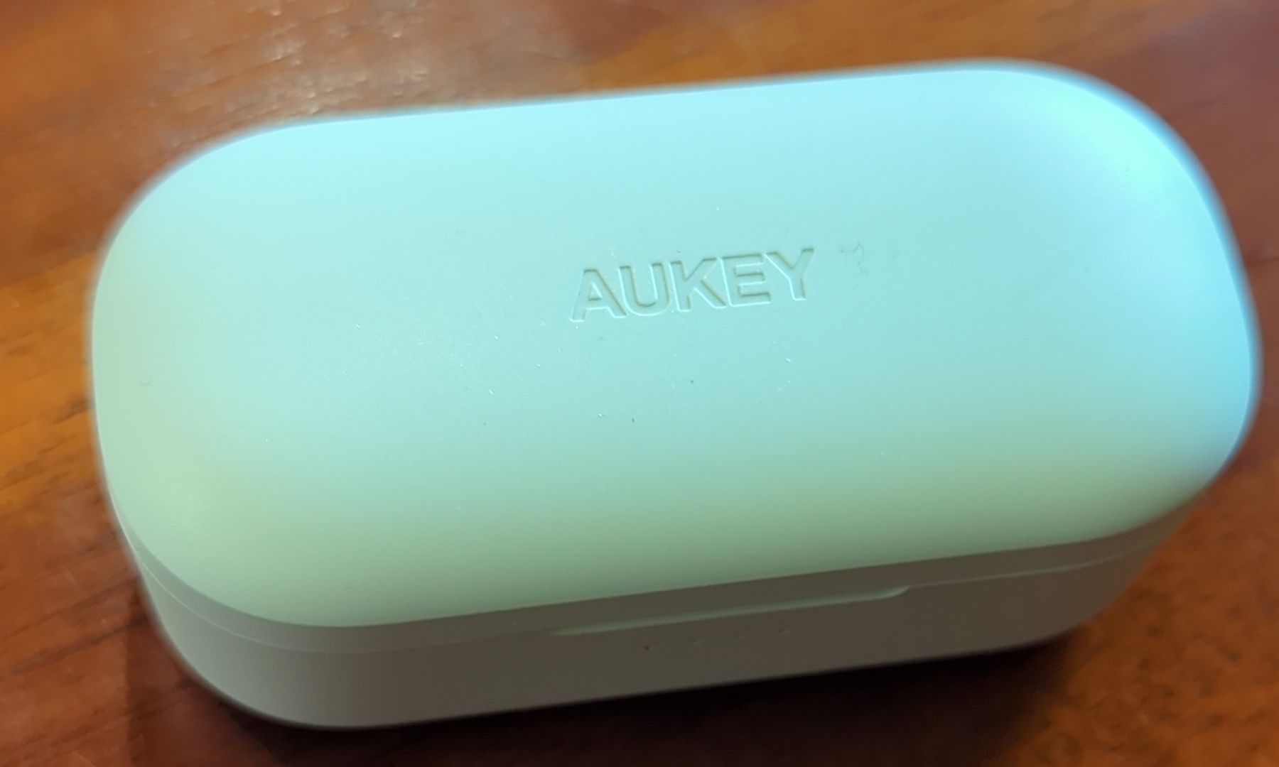 Aukey Kopfhörer: AUKEY Bluetooth Kopfhörer in türkis mit Ladestation – Neu (gemäss Beschreibung) aus Neuheim von sh0_gbz7