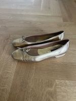 Globus Ballerinas aus goldenem Leder