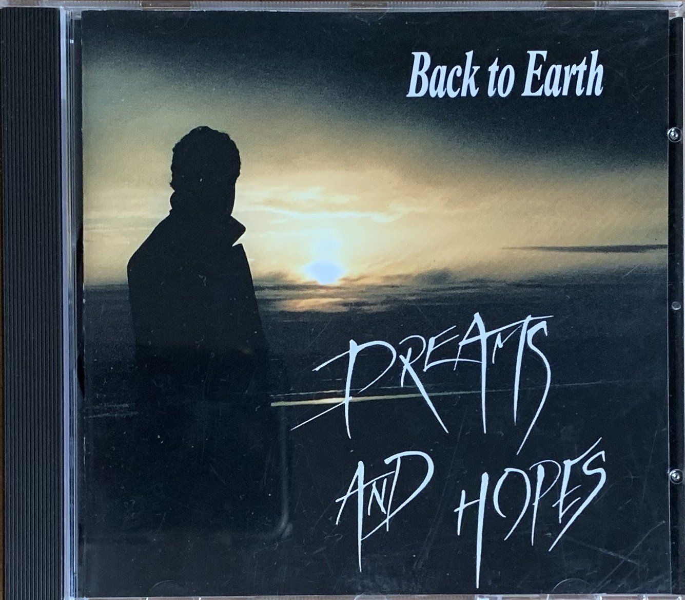 CD: CD BACK TO EARTH - DREAMS AND HOPES – Usato da Birsfelden venduto da Emporio82