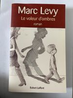 Roman Le Voleur d'ombres de Marc Levy, bon état