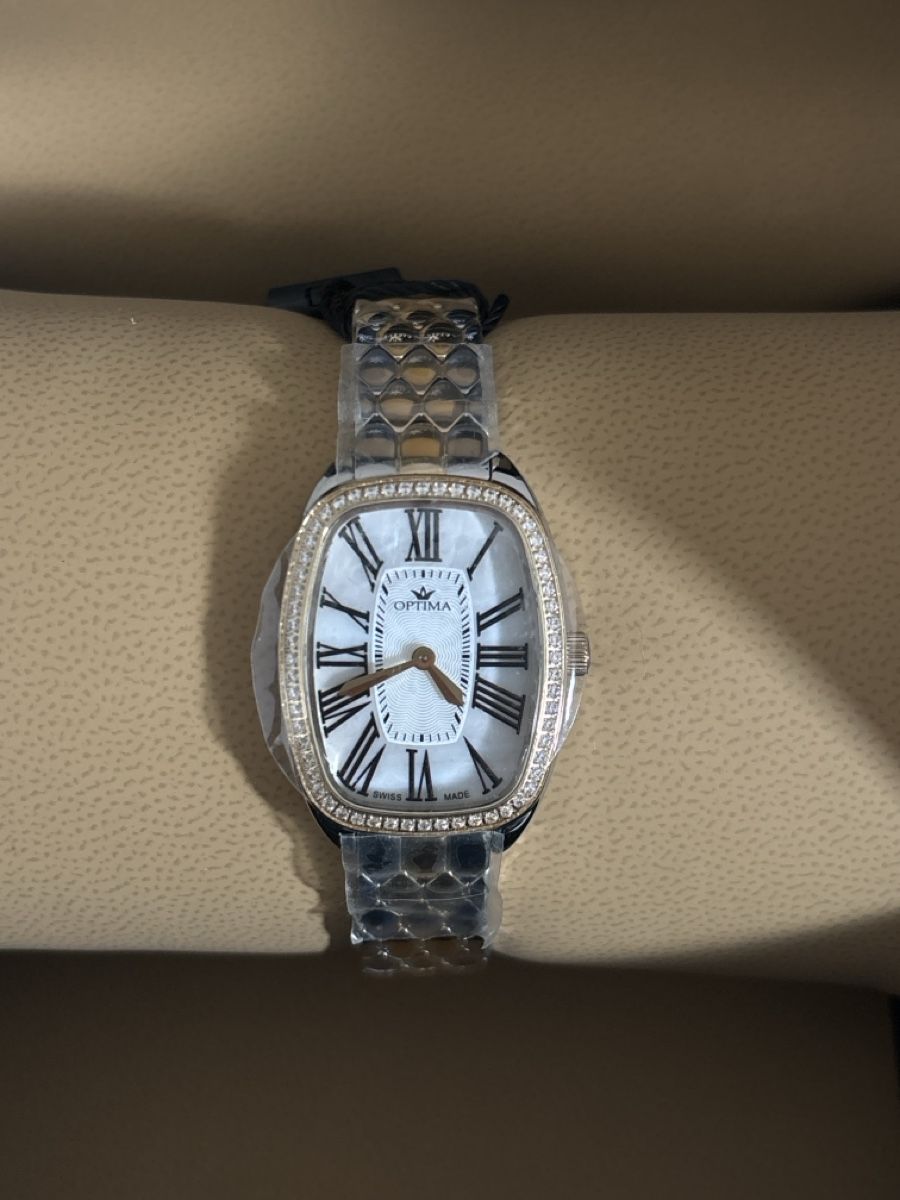 Swiss Montres: Montre OPTIMA – Neuf avec emballage d'origine à La Chaux-de-Fonds par Titine. 1