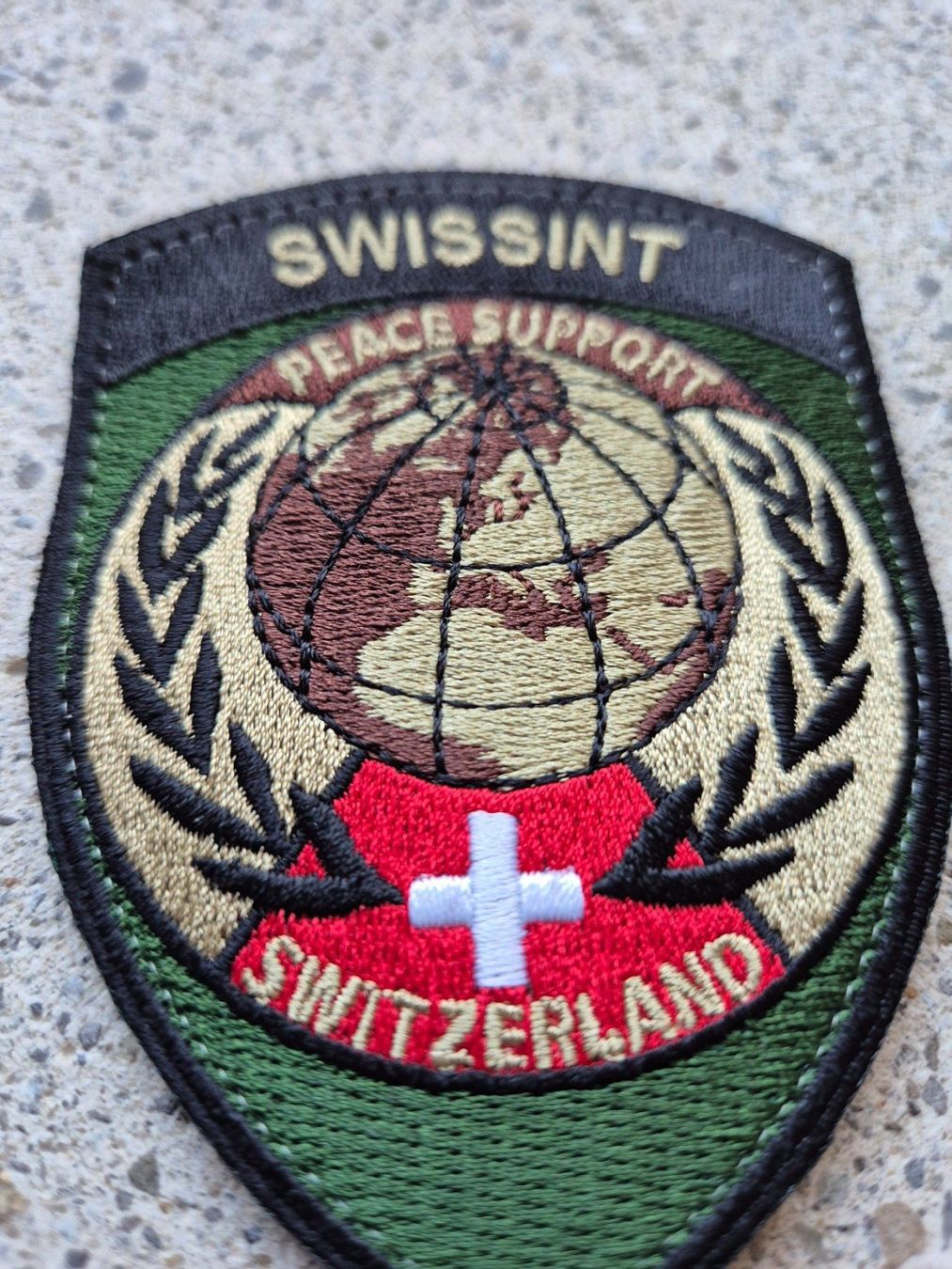 Schweizer Armee Placchette & Badge: *** Badge Swissint Peace Support mit klett *** – Nuovo e nell'imballaggio originale da Riedholz venduto da fr_sIruP 2