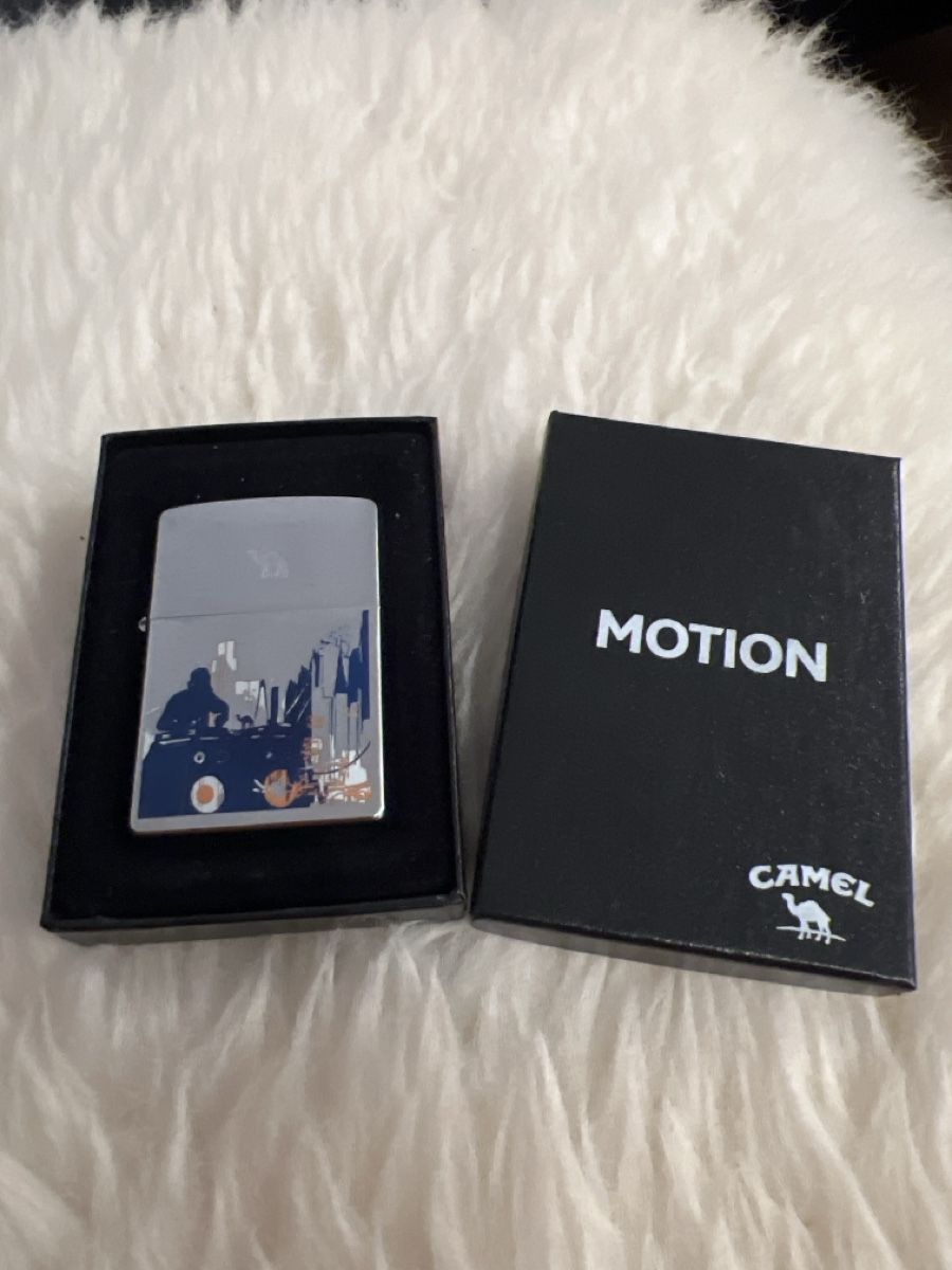 Zippo Accendini: Camel Zippo Motion  – Nuovo e nell'imballaggio originale da Uznach venduto da Apuutze
