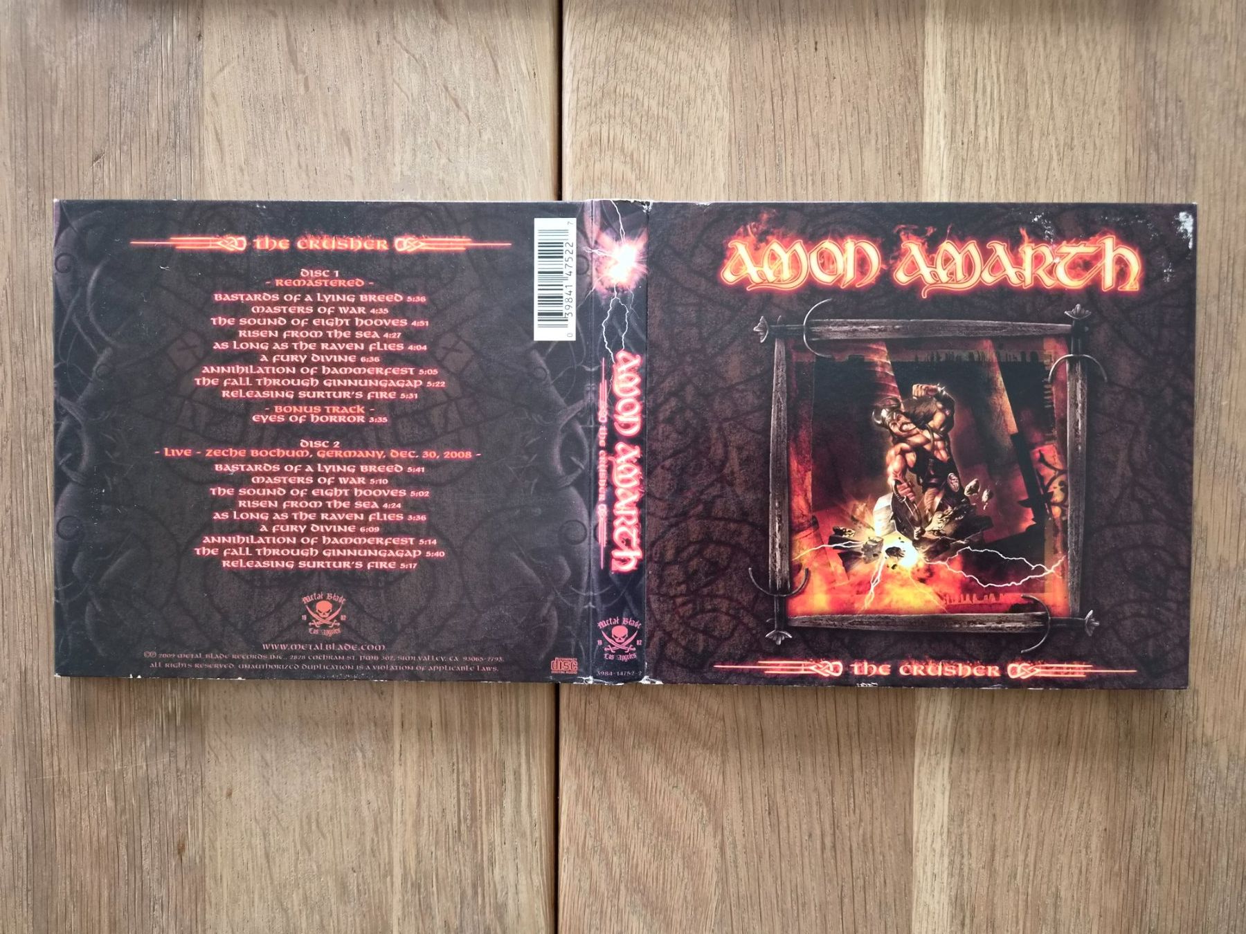 CD: DCD Amon Amarth - The Crusher - Remastered Edition, 2009 – Usato da Nebikon venduto da Harley-Davidson01