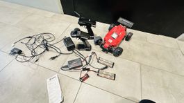 RC Auto Reely Rhino Nitro Buggy mit Zubehoer