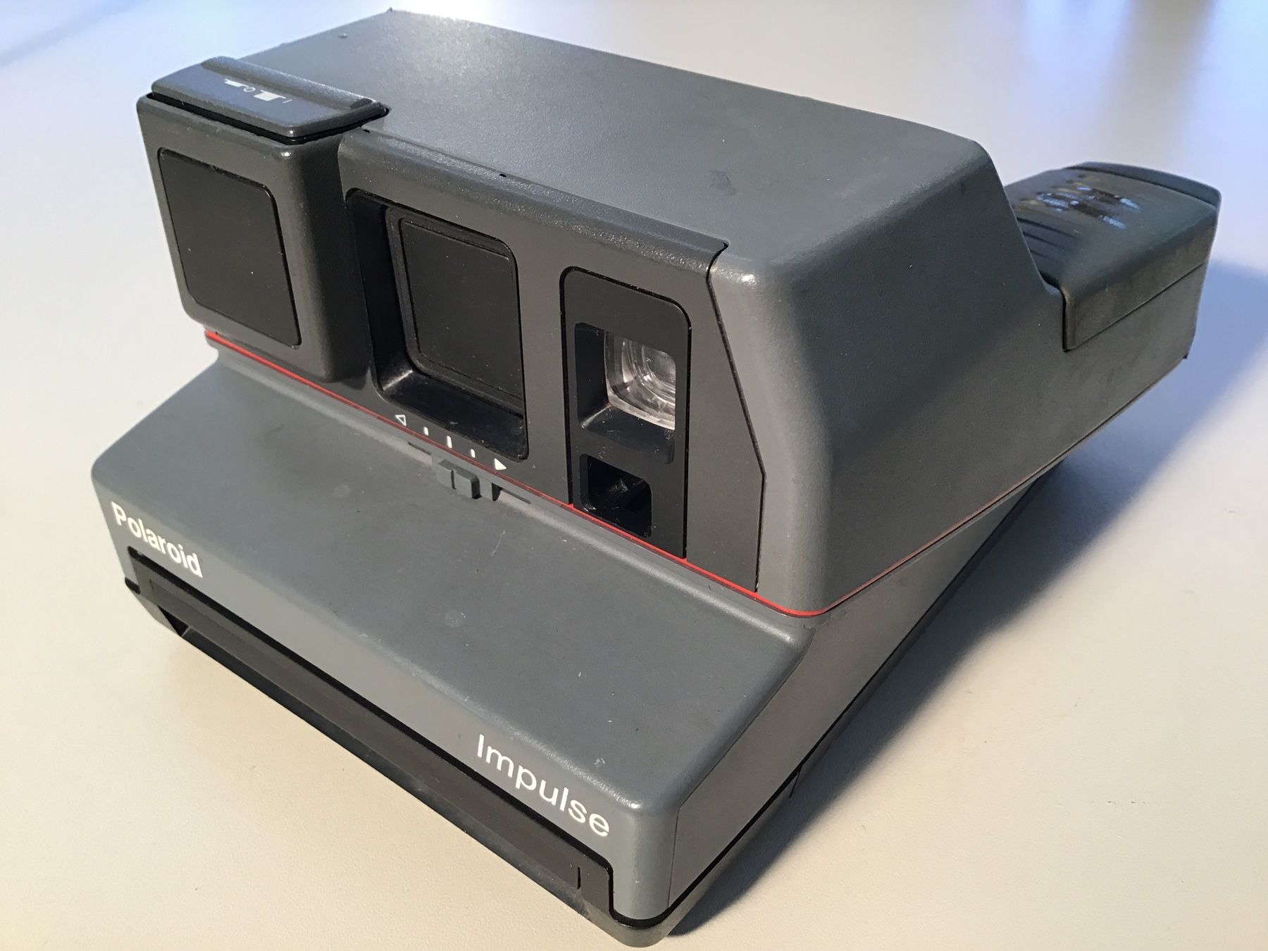 Polaroid Fotocamera: Sofortbildkamera Polaroid Impulse grau – Usato da Dübendorf venduto da sdbu-frappant