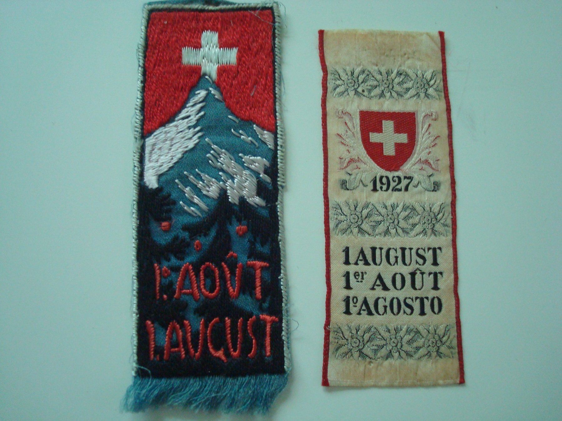 Placchette & Badge: Abzeichen 1. August 1924 + 1927, Seidenbändel – Usato da Riehen venduto da Baerewaegli