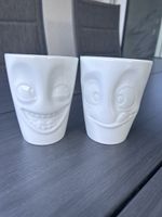 58 Products - Zwei Tassen mit Gesicht